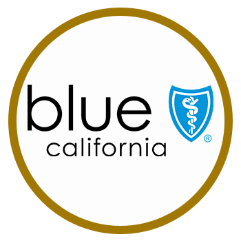 blue shield logo in gold circle white background